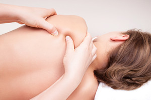 Women receiving a deep tissue massage.