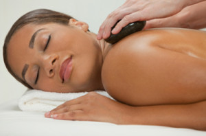 A woman receiving fibromyalgia massage therapy.