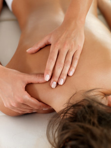 Woman receiving medical massage therapy.